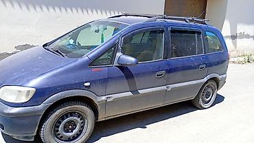 опел зафира б: Opel Zafira – 7 yerlik ailə miniveni Xüsusiyyətlər: - Korpus: 5 — 2