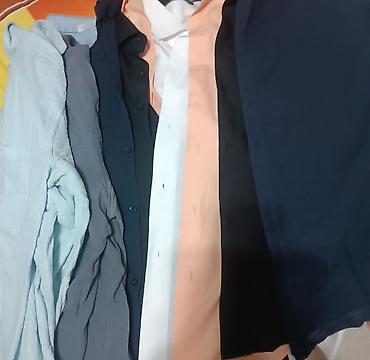 Kişi geyimləri: Köynekler.Razmerleri L ve XL. 6 ededi 75azn — 1