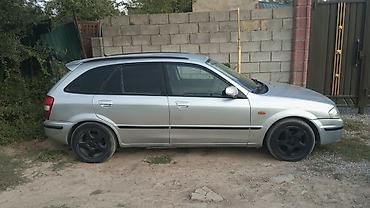 стекло боковые: Mazda 323: 1999 г., Механика, Бензин, Универсал — 2