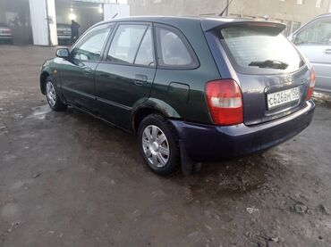 Mazda: Mazda 323: 2001 г., 1.6 л, Механика, Бензин, Седан