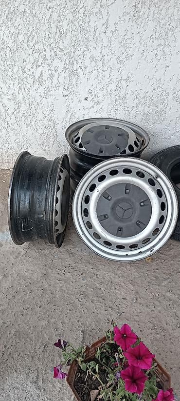 12 9: Стальные диски Mercedes + центральные колпаки - Комплект из 4 шт. - — 1