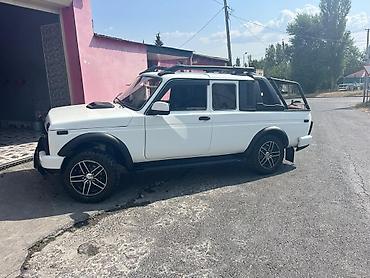 traktor te 42: Lada Niva (Uzun baza, 4 qapı) – off-road modifikasiya edilmiş — 4