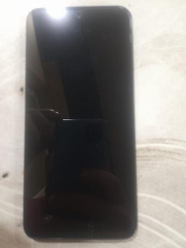 smart mini telefon: Smartfon – damla formalı ön kamera kəsiyi olan, tam ekranlı qara — 1