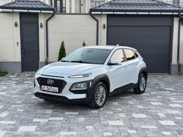хундай гетс машина: Белый кроссовер Hyundai Kona – это компактный автомобиль, идеально