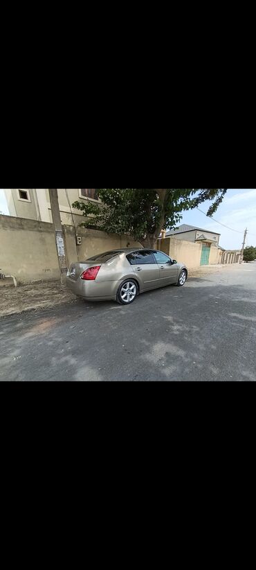 Nissan: Nissan Maxima: 3.5 l | 2003 il Sedan — 9