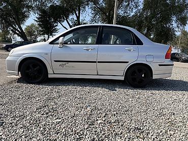 tiger auto: Suzuki Liana: 2003 г., Механика, Бензин, Седан — 1