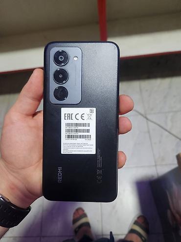 xiaomi mix fold 4: Xiaomi Redmi smartfon - Arxa tərəfdə üçlü kamera modulu: 50 MP əsas — 4