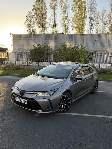byd e9 1: Toyota Corolla: 2019 г., 1.8 л, Вариатор, Гибрид, Седан — 4