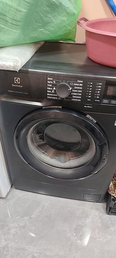 Electrolux PerfectCare 600 paltaryuyan maşın (qara rəng) - Ön — 1