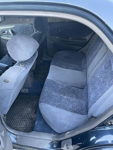 машинка б у: Mazda 323: 1999 г., 1.6 л, Механика, Бензин, Седан — 8