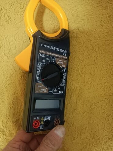 Multimetri: Digitalne strujne klešta/multimetar DT-266 Opis: - Digitalni clamp — 3