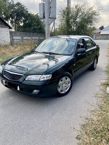 мазда 21: Mazda 626: 1999 г., 1.8 л, Механика, Бензин, Седан