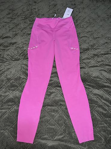Helanke, biciklistički šortsevi: NIKE Swift Women's High-Waisted 7/8 Running Leggings with Pockets vel — 7