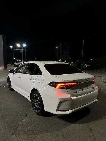 byd e1: Toyota Corolla: 2022 г., 1.8 л, Автомат, Гибрид, Седан — 6