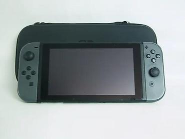 Nintendo Switch: Uz konzolu dolazi: Tablet (konzola) Joy-Con džojstici Punjač — 9