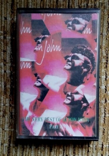 Kasete, CD i DVD: 4 originalne kasete Elton John (Very Best + Reg Strikes Back) — 3