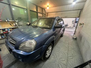 Hyundai: Hyundai Tucson: 2.7 l | 2006 il Krossover — 2