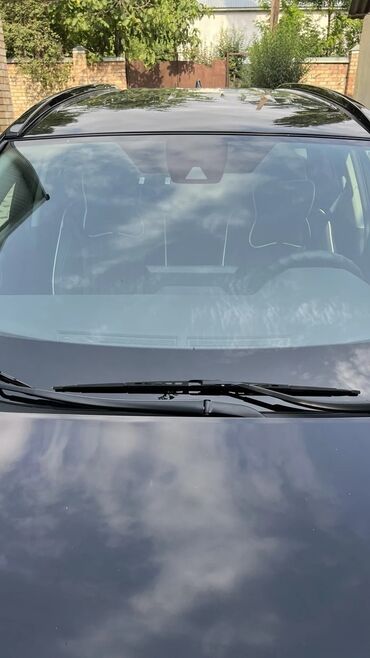 тойота королла гибрид бишкек: Черный кроссовер Toyota RAV4 с характерным дизайном передней части