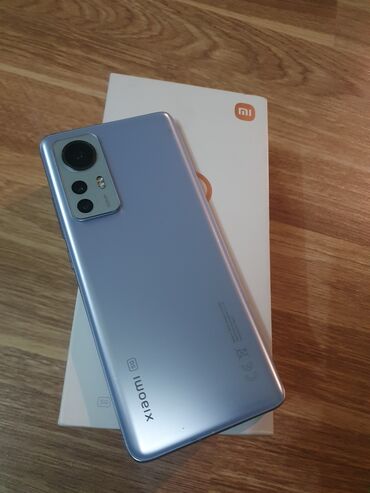 Xiaomi: Xiaomi 12X, rəng - Bənövşəyi, 
 Barmaq izi — 1