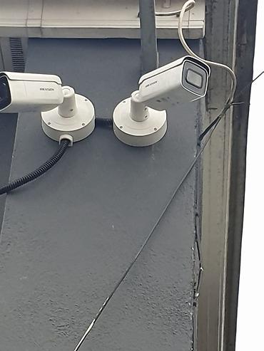 socket 1155: Уличные IP‑видеокамеры Hikvision на кронштейнах с монтажными коробками — 1
