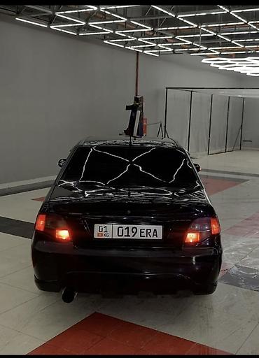 Другие автомобили: Седан черного цвета с доработанным экстерьером. Основные особенности — 3