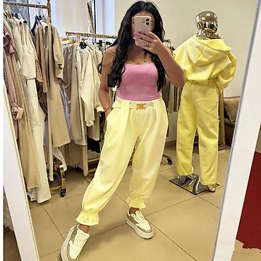 Pantalone: ✅Ženske široke pantalone sa karnerima na nogavicama i kaišem
✅2400 din — 2