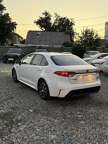 Toyota: Toyota Corolla: 2023 г., 1.8 л, Гибрид, Седан — 3