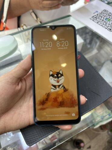 телефон редим 10: Смартфон Xiaomi Redmi 9A в сине-бирюзовом градиентном корпусе. Оснащен