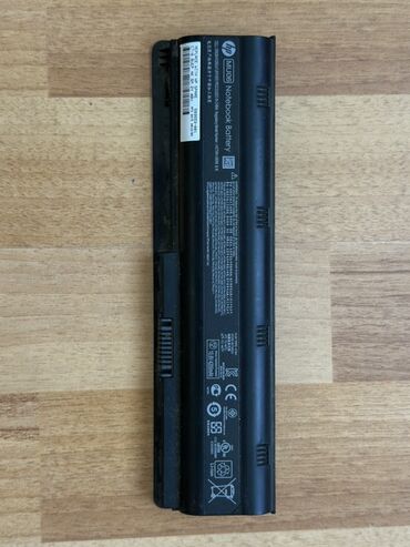 Noutbuklar üçün örtük və çantalar: HP MU06 noutbuk batareyası. Qara rəngdədir və noutbukunuzu elektrik