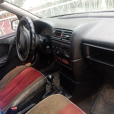 210 3 2: Opel Vectra: 1993 г., 1.8 л — 6
