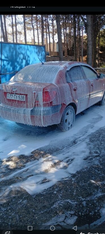 Kia: Kia Pride: 1.5 l | 2006 il Sedan — 11