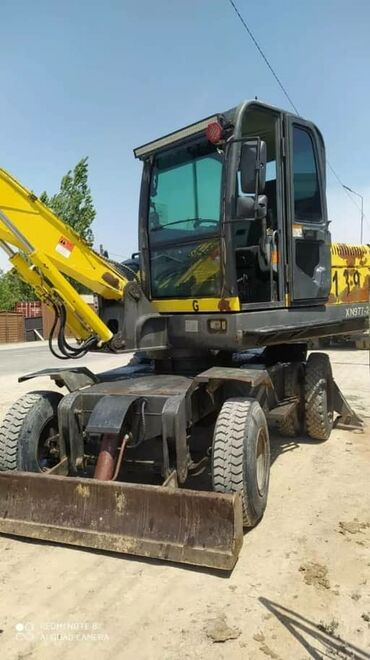 Экскаваторы: Экскаватор, 2014 г., Колесный — 10