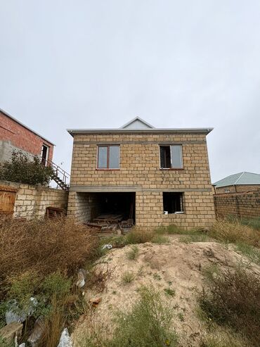 Həyət evləri və villaların satışı: Satılır: 2 mərtəbəli yarımçıq tikili (daş ev) - Tikinti materialı — 2
