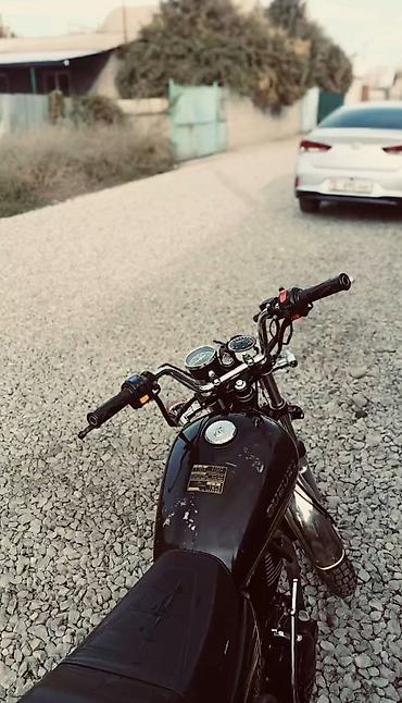 рига мото: Мотоцикл Suzuki GN200 - Классический дорожный дизайн с круглой фарой — 5