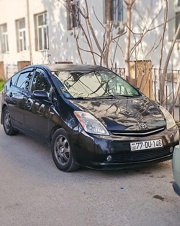 Avtomobil satışı: Toyota Prius (2-ci nəsil) – qara rəng, hatchback kuzov. - Hibrid — 1