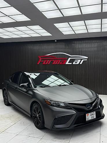 byd e2 2024: Toyota Camry: 2022 г., 2.5 л, Автомат, Гибрид, Седан — 1