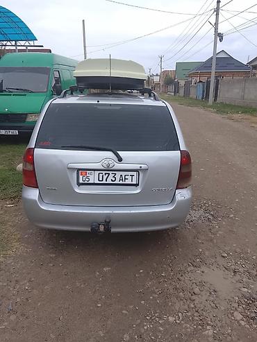 на corolla: Toyota Corolla: 2004 г., Механика, Универсал — 5