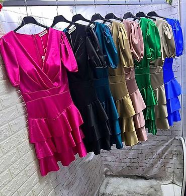 Haljine: Saten mini haljina sa volanima
Po super ceni 1999 din 
One size — 10