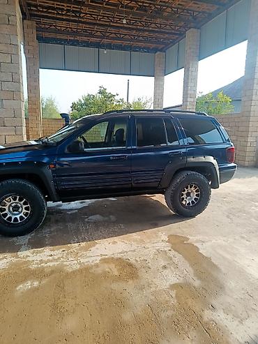 ekskavator satisi bakida: Jeep Grand Cherokee (WJ) off-road təkmilləşdirilmiş SUV Xarici: - — 3