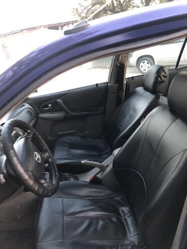 срочно продаю ниссан примера: Mazda 323: 2002 г., 1.5 л, Механика, Бензин, Седан