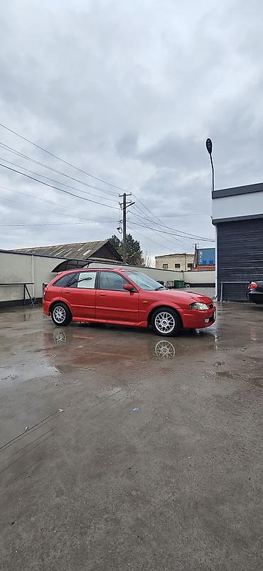 Mazda: Mazda Familia: 2001 г., 2 л, Автомат, Бензин, Универсал — 8