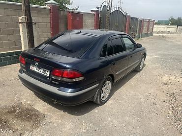 w210 2 2: Mazda 626: 1997 г., 1.8 л, Механика, Бензин, Седан — 3