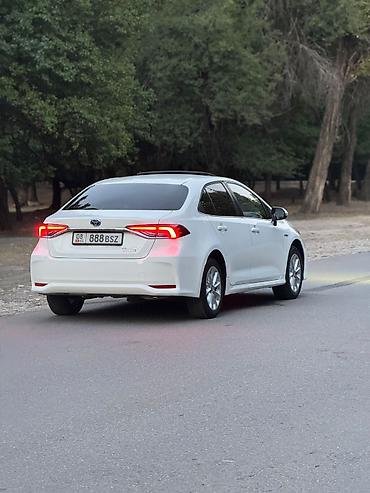 i 10: Toyota Corolla: 2022 г., 1.8 л, Автомат, Гибрид, Седан — 4