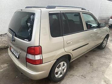 10 лет в одних руках: Mazda Demio: 1999 г., 1.3 л, Автомат, Бензин, Хэтчбэк — 6