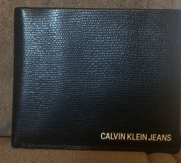 qara canta: Calvin Klein ozunan alinib 100% original 100% dari.Cox az istifada
