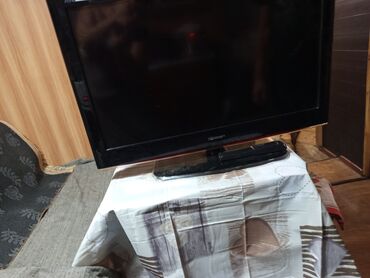прием швейных машинок: Телевизор Hisense модели LHD32V08S. Устройство работает от сети с