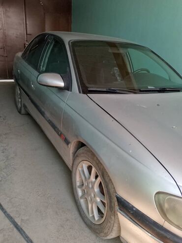 в рассрочку машину: Opel Omega: 1999 г., 2.5 л, Механика, Бензин, Седан