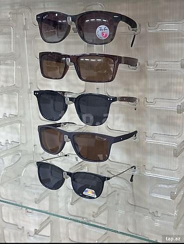 optika vitrini: Məhsul: Eynək sərgiləmə stendi Təsvir: - Material: şəffaf, möhkəm — 3