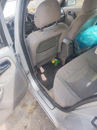 bmw e32: Nissan Almera: 2000 г., 1.8 л, Механика, Бензин, Седан — 4