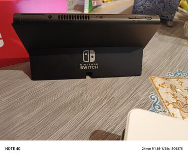 Nintendo Switch: Oyun konsoluMODEL OLLED satilir yenu kimidir sadece yanlara